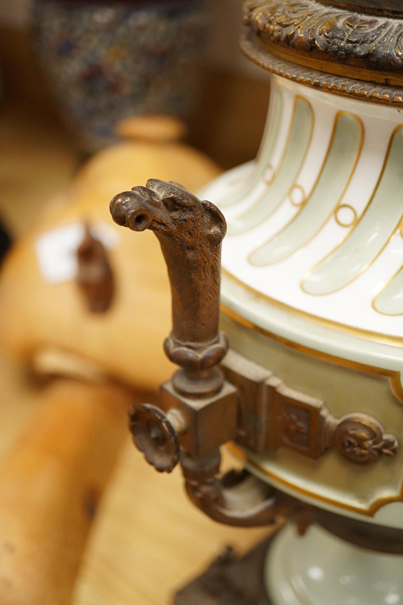 A French Sevres style porcelain and ormolu table lamp, with central decoration of a lyre amongst foliage, 49cm
